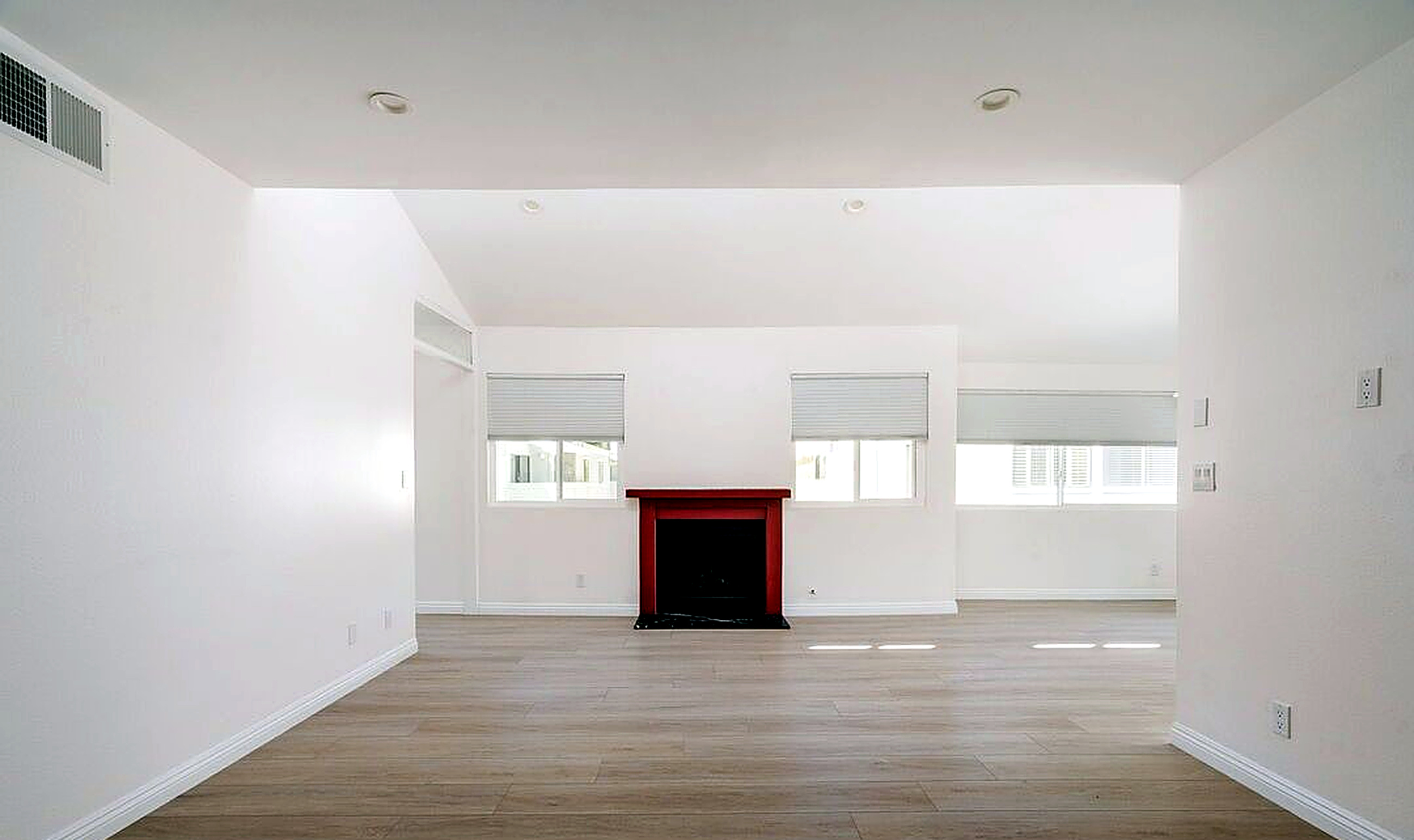 Living room with fireplace at 22125 Burbank Blvd #7, Woodland Hills condo sold with Stephen White